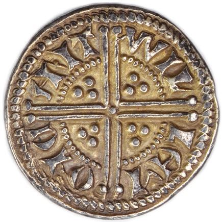 Una grande croce accantonata da tre globetti per quadrante su questa moneta eccezionale battuta a Canterbury