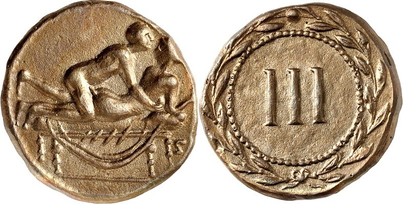 Un esemplare di "spintria" in bronzo probabilmente usato nelle case di piacere dell'antica Roma come "contromarca di servizio"; quella che in tempi più recenti sarebbe diventata la ben nota "marchetta"