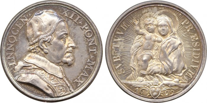 Esemplare in argento della medaglia coniata nel 1699 e che rende omaggio sia al quadro del Maratta che al mosaico dell'allora reggia pontificia del Quirinale