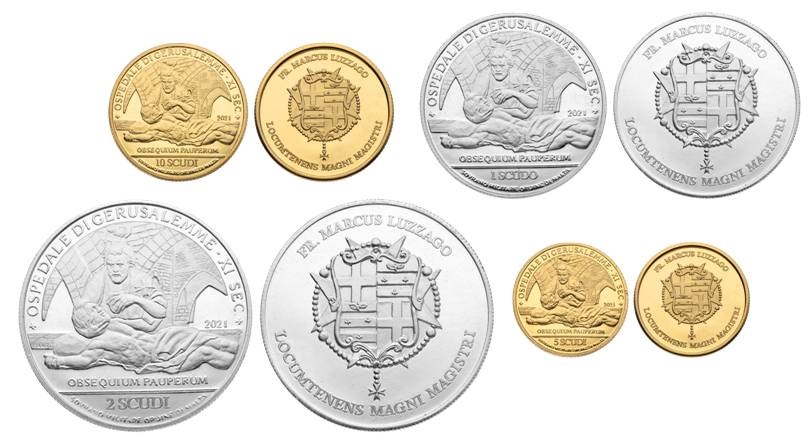 Le quattro monete in scudi, le due in oro da 5 e 10 e i grandi moduli in argento da 1 e 2 scudi